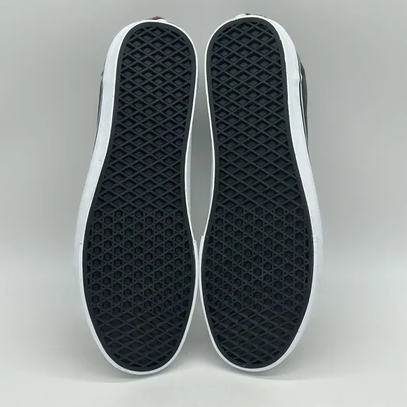 Vans Black and White Sneakers with Edgy Design