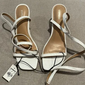 White kitten, heel lace up, wraparound